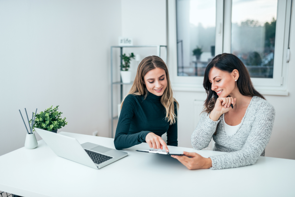 two people working together